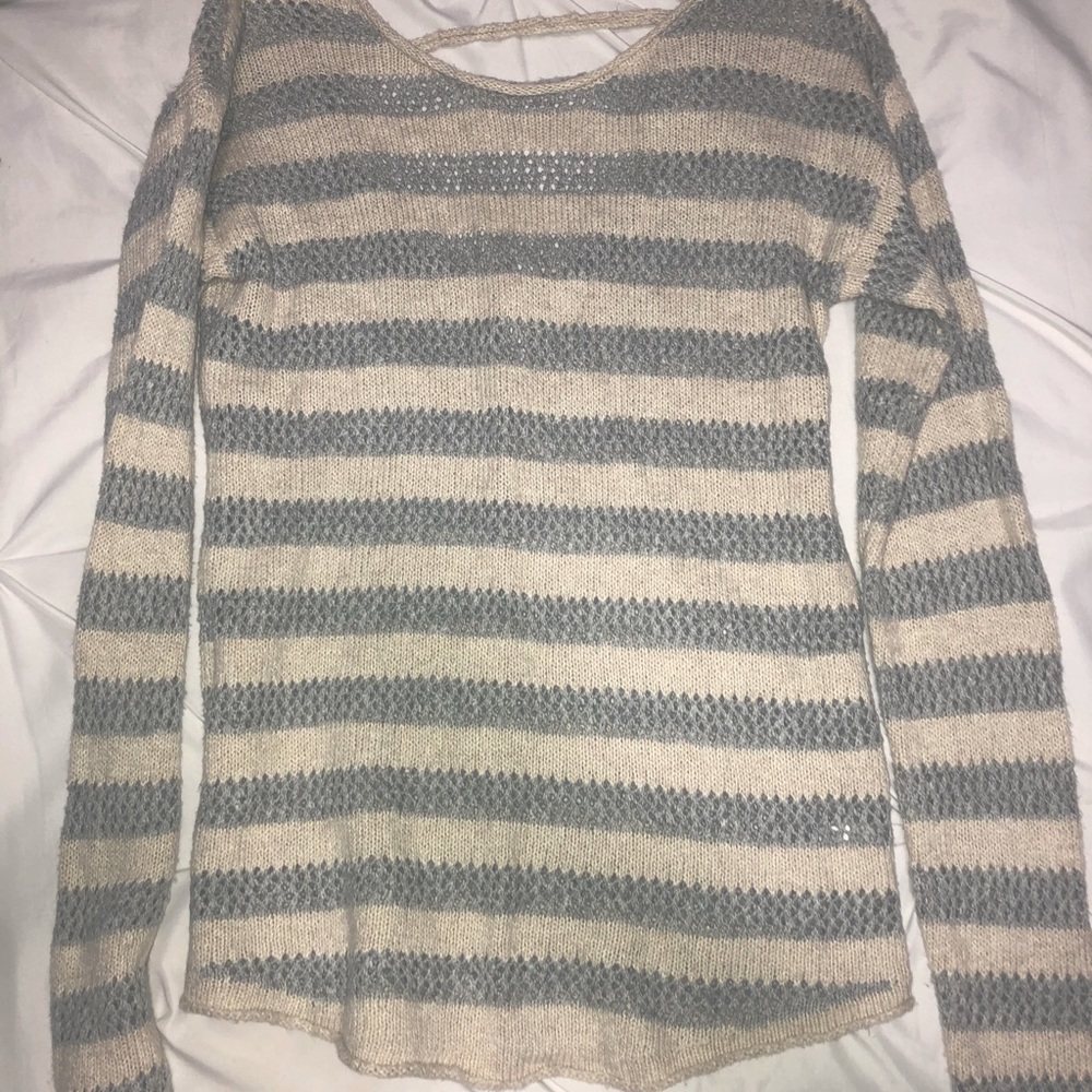 Small grey and cream colored sweater like new!